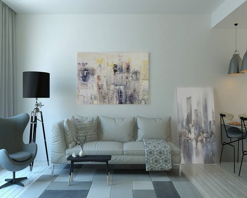 Person doing light home chores, organizing the living room in a calm manner, evening light in Chile.